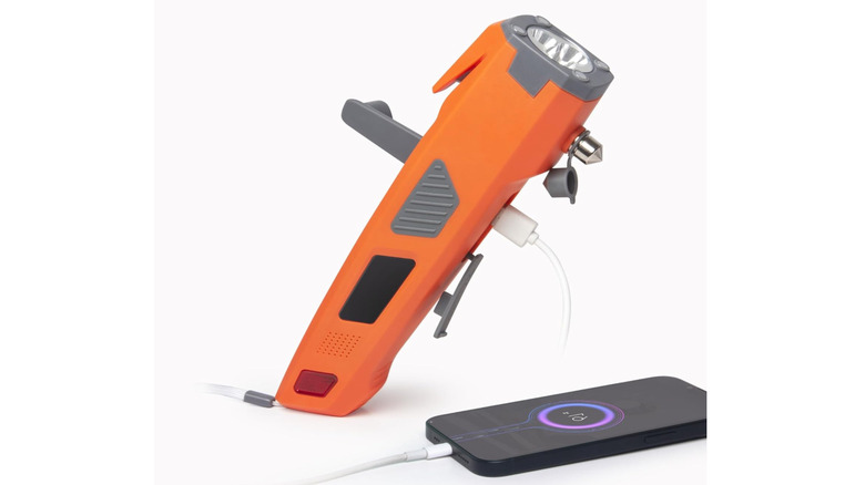 Luxon 7-in-1 Car Safety Tool charging a phone