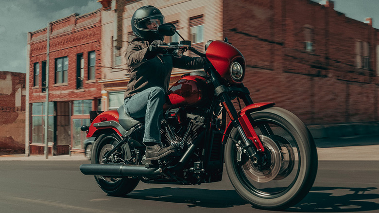 front side view of a rider on a 2025 Harley-Davidson Low Rider S riding down the road