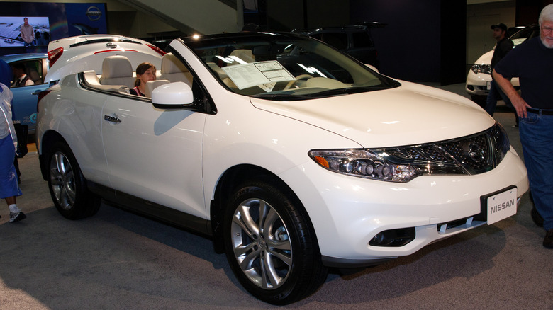 A white Nissan Murano CrossCabriolet on display at an auto show