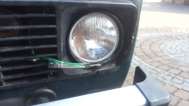 Lada Niva headlight wiper system in the works