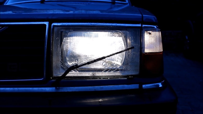 The headlight wiper system of the Volvo 240 wagon