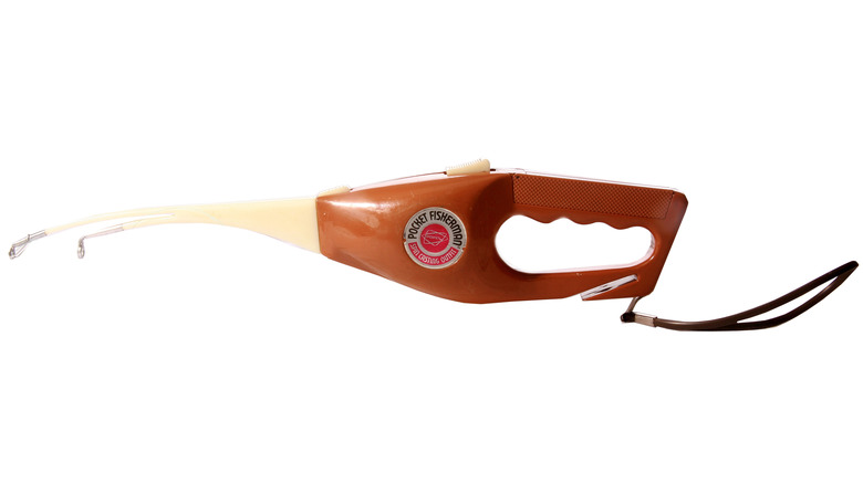 The Popeil Pocket Fisherman out of its box and extended