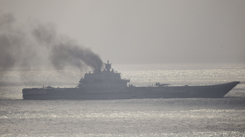 Admiral Kuznetsov belching smoke at sea