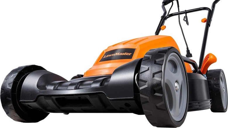 Orange and black LawnMaster mower up close with a white background