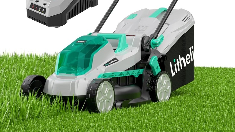 A Litheli grey and black lawn mower in the middle of cutting down grass