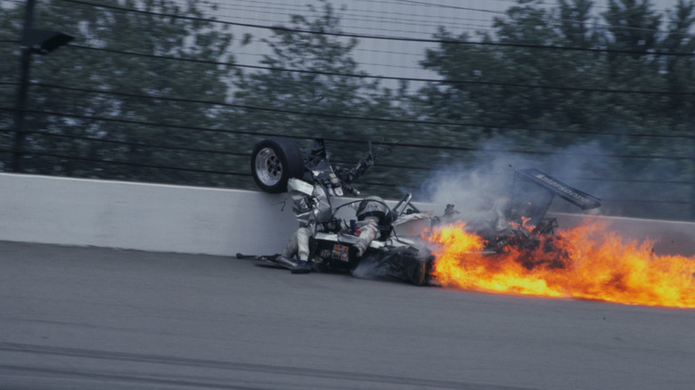 Crash of Danny Ongais showing his vehicle skidding along the wall, photo taken from infield