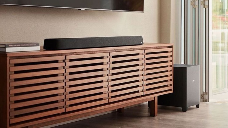 A Polk subwoofer in a corner of a room