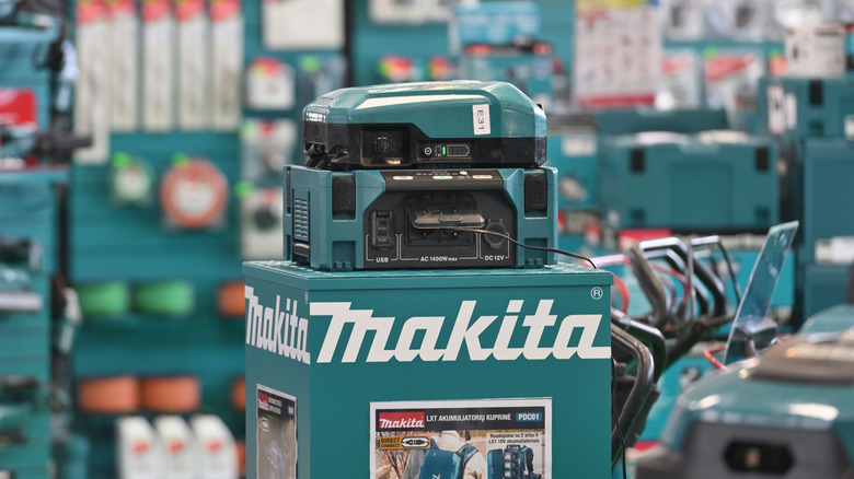 A Makita battery pack on display in a store