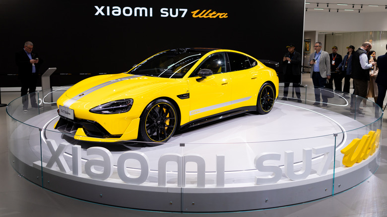 A Xiaomi SU7 Ultra performance EV sedan in striking yellow colorway seen here at Mobile Congress 2025 in Barcelona, Spain