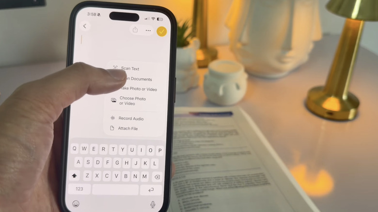 person scanning with iPhone Notes
