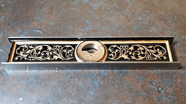 A restored Davis level on a table.