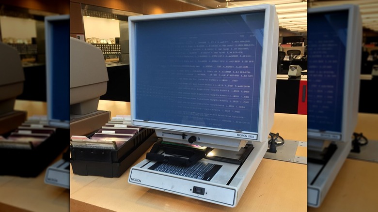 A microfiche reader in a library.