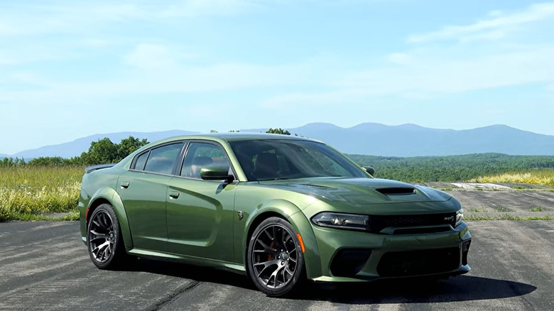 2021 Dodge Charger Hellcat Redeye parked in a rural area.