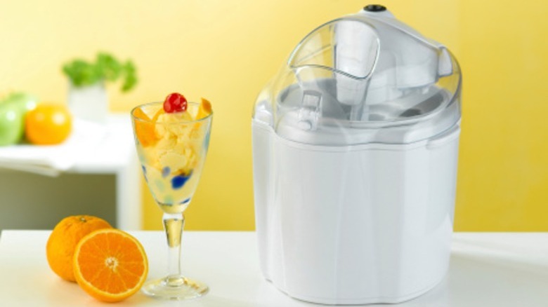 An ice cream maker on a kitchen counter