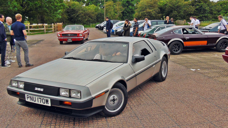 Front 3/4 view of DeLorean DMC-12 at classic car show.