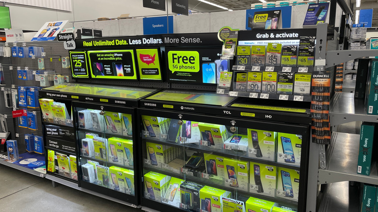 A Straight Talk Wireless display section in a Walmart store