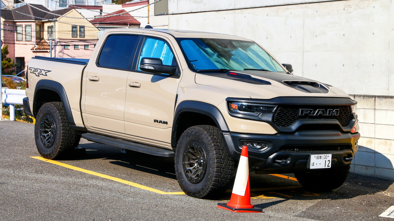 A Ram TRX 1500 truck parked in a street.