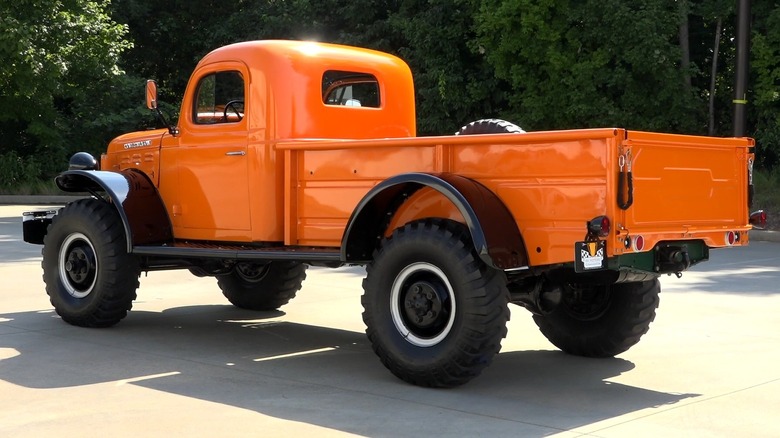 Orange and black Dodge Power Wagon rear profile shot