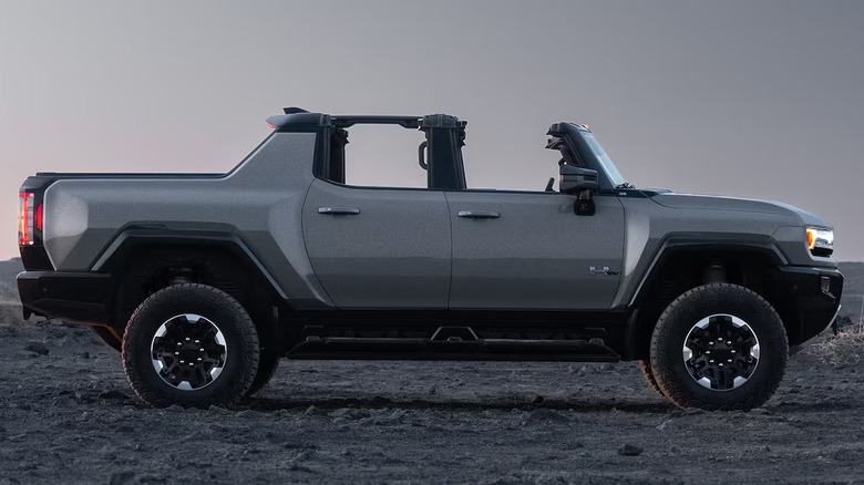 Side view of a silver GMC Hummer EV pickup with the Sky Panels removed