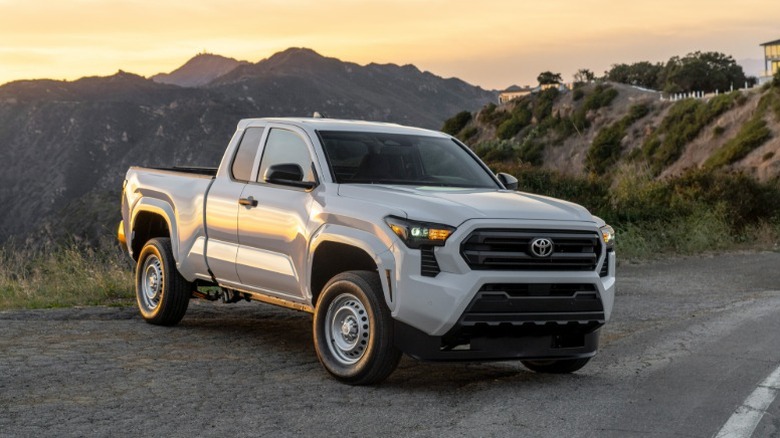 A white 2026 Toyota Tacoma on a mountain road