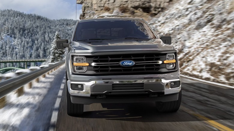 Front view of the 2026 F-150 on a mountain road