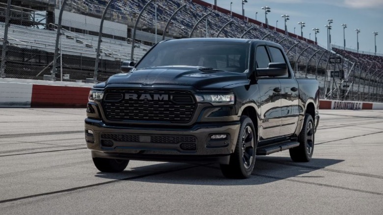 A black 2026 Ram 1500 on a race track