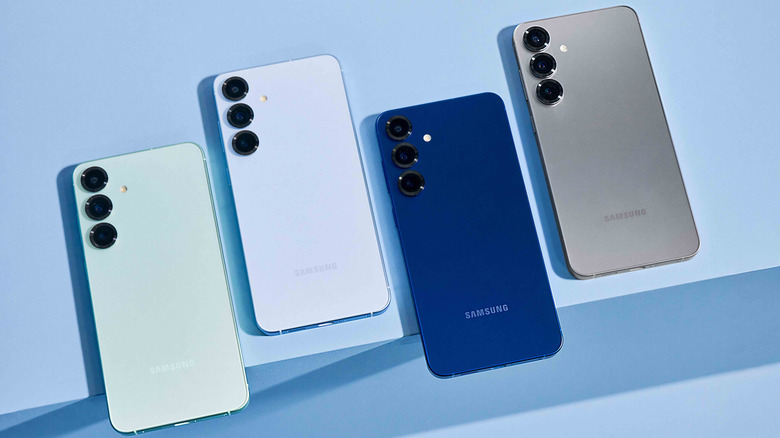 Samsung phones lined up next to each other.