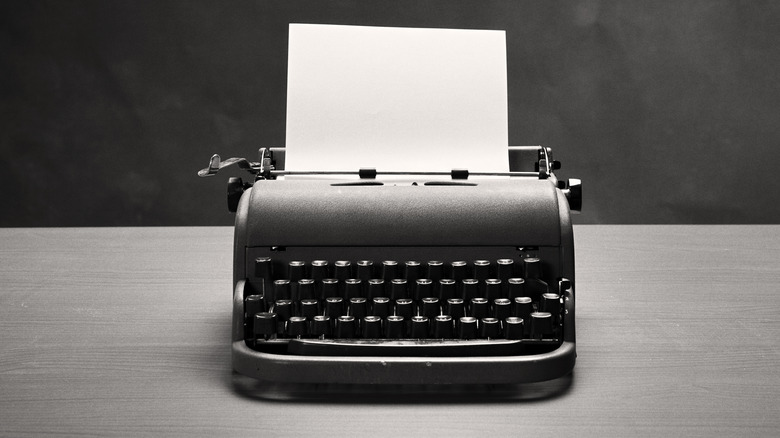 A typewriter on a desk