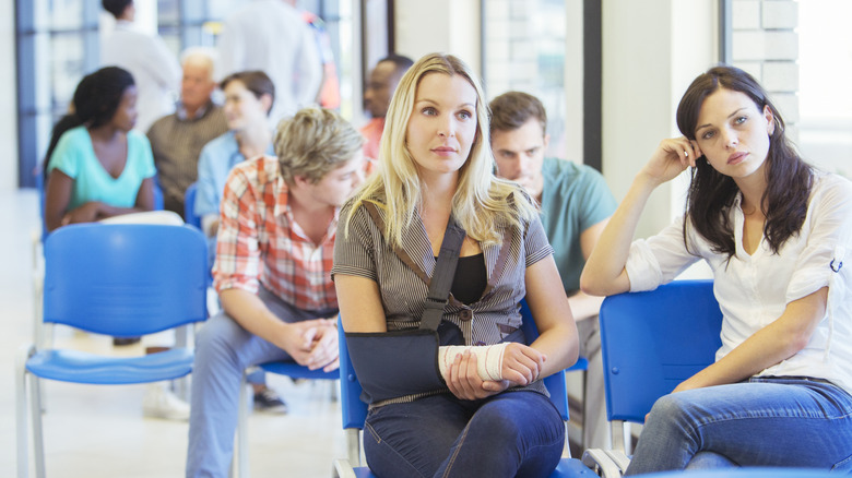 People sitting in a waiting room.