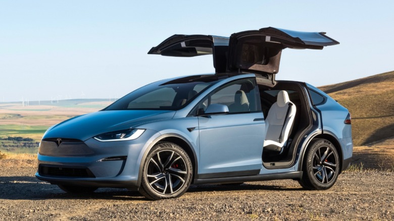 the Tesla Model X with its rear Falcon Wing doors open