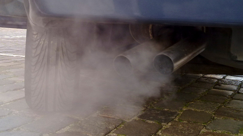 The exhaust pipes of an automobile, venting exhaust