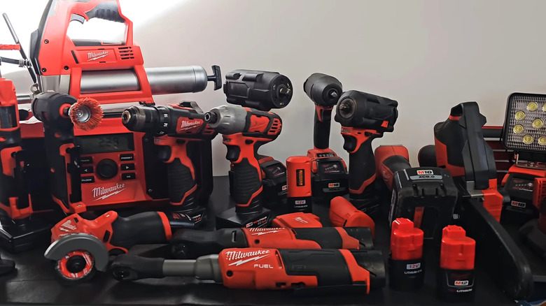 A large collection of red Milwaukee tools