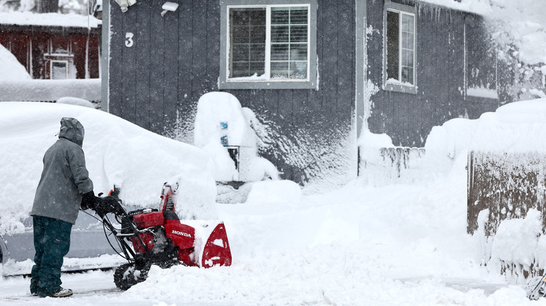 Person using Honda snow blower