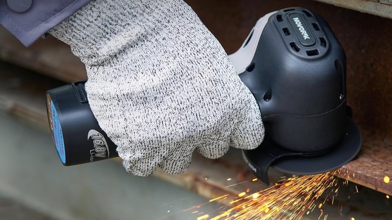 Novorik Cordless Angle Grinder grinding a beam