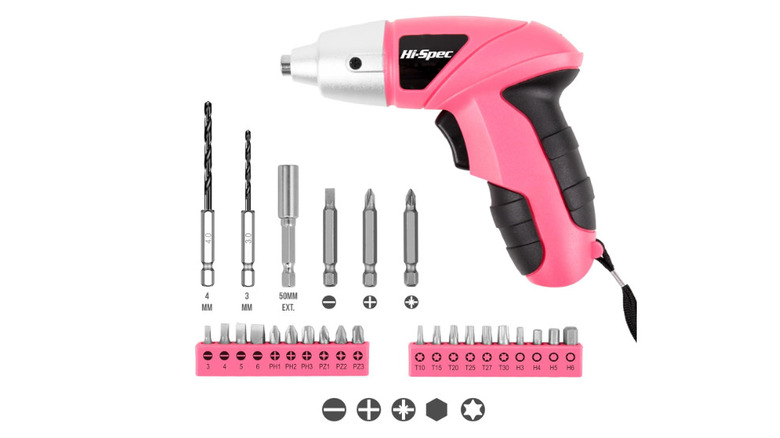 Pink electric power drill with multiple drill bit heads on a white background