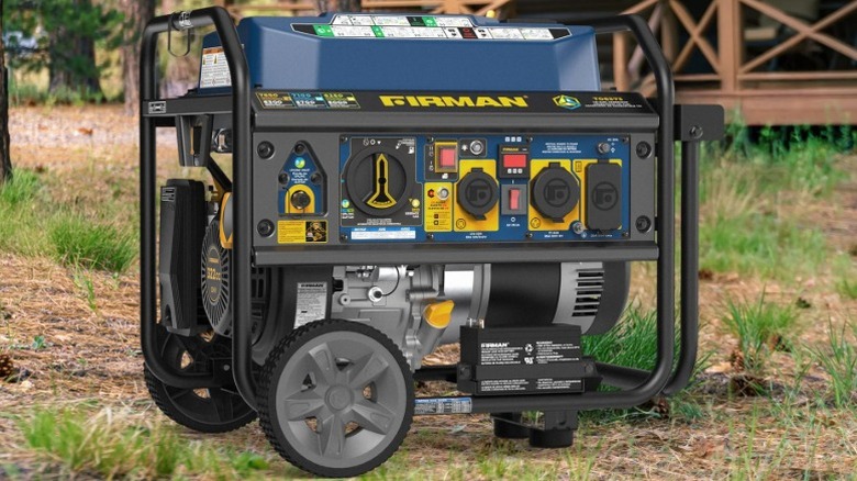 Firman 6,300-watt tri-fuel generator in the woods, with a cabin in the background