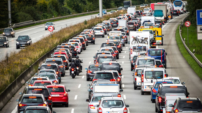 High-angle view of a congested three-lane motorway.