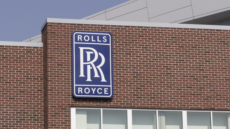 Rolls-Royce logo on a brick building
