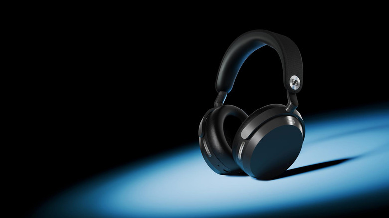 A pair of Sennheiser Momentum 5 wireless headphones against a blue and black background