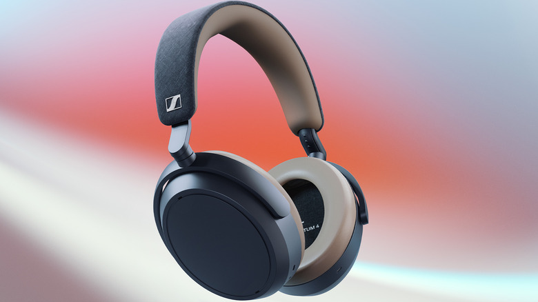 The Sennheiser Momentum 4 Wireless headphones on a stylized background.