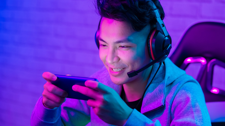 gamer enjoying session on his mobile