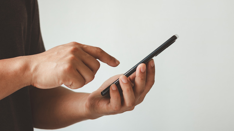person using phone