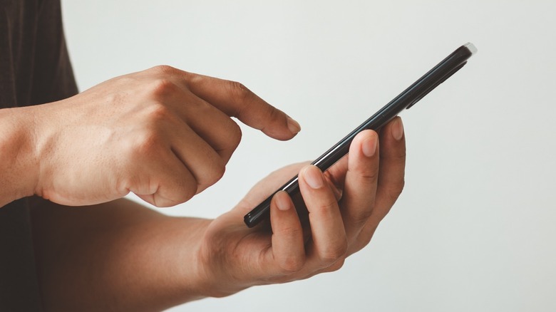 person using phone