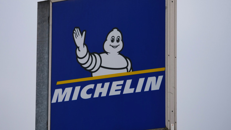 A sign displaying the Michelin logo.