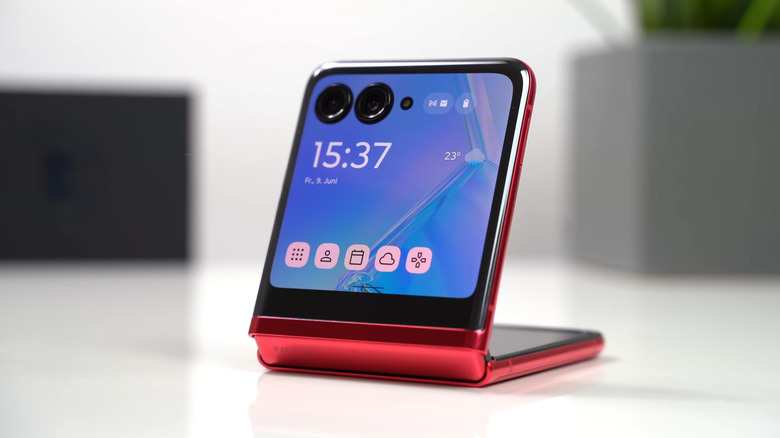 A Motorola Razr foldable phone on top of a table