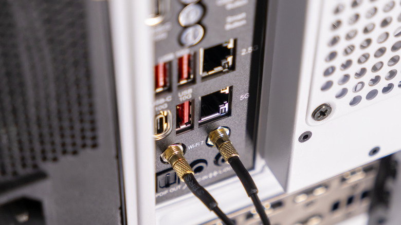 back of a PC case showing USB and Wi-Fi connections