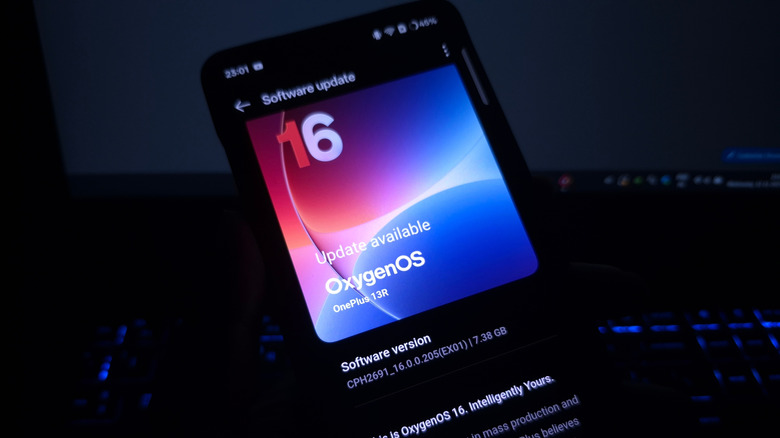A OnePlus phone on the OxygenOS 16 software update screen.