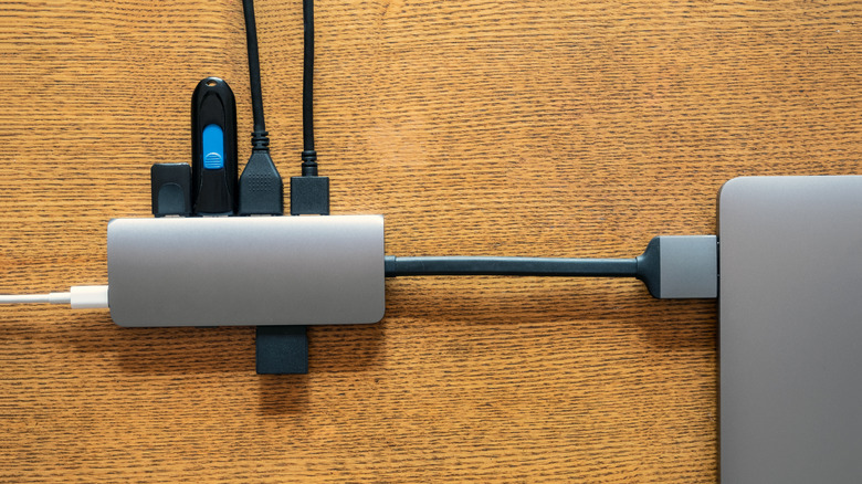 MacBook with dongles