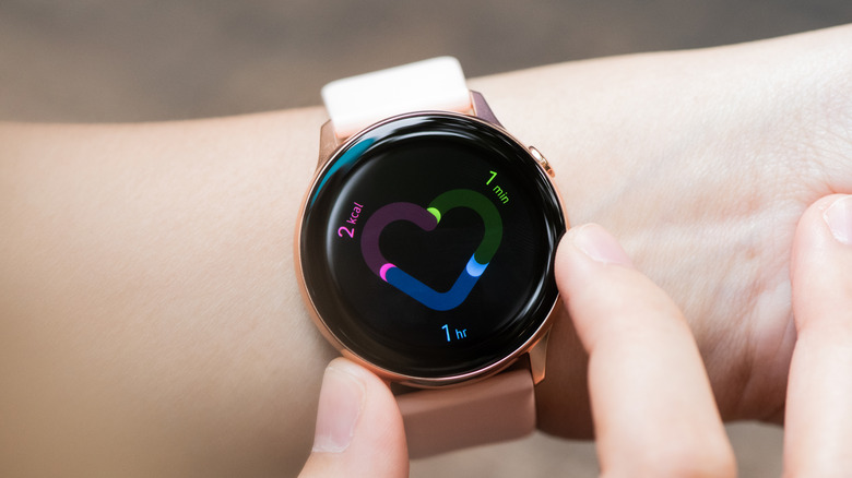 A Samsung Galaxy smartwatch measuring fitness metrics
