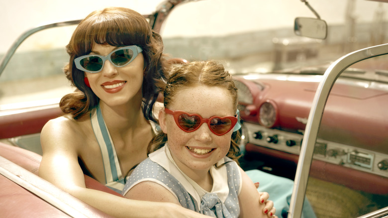 Mother and daughter in car